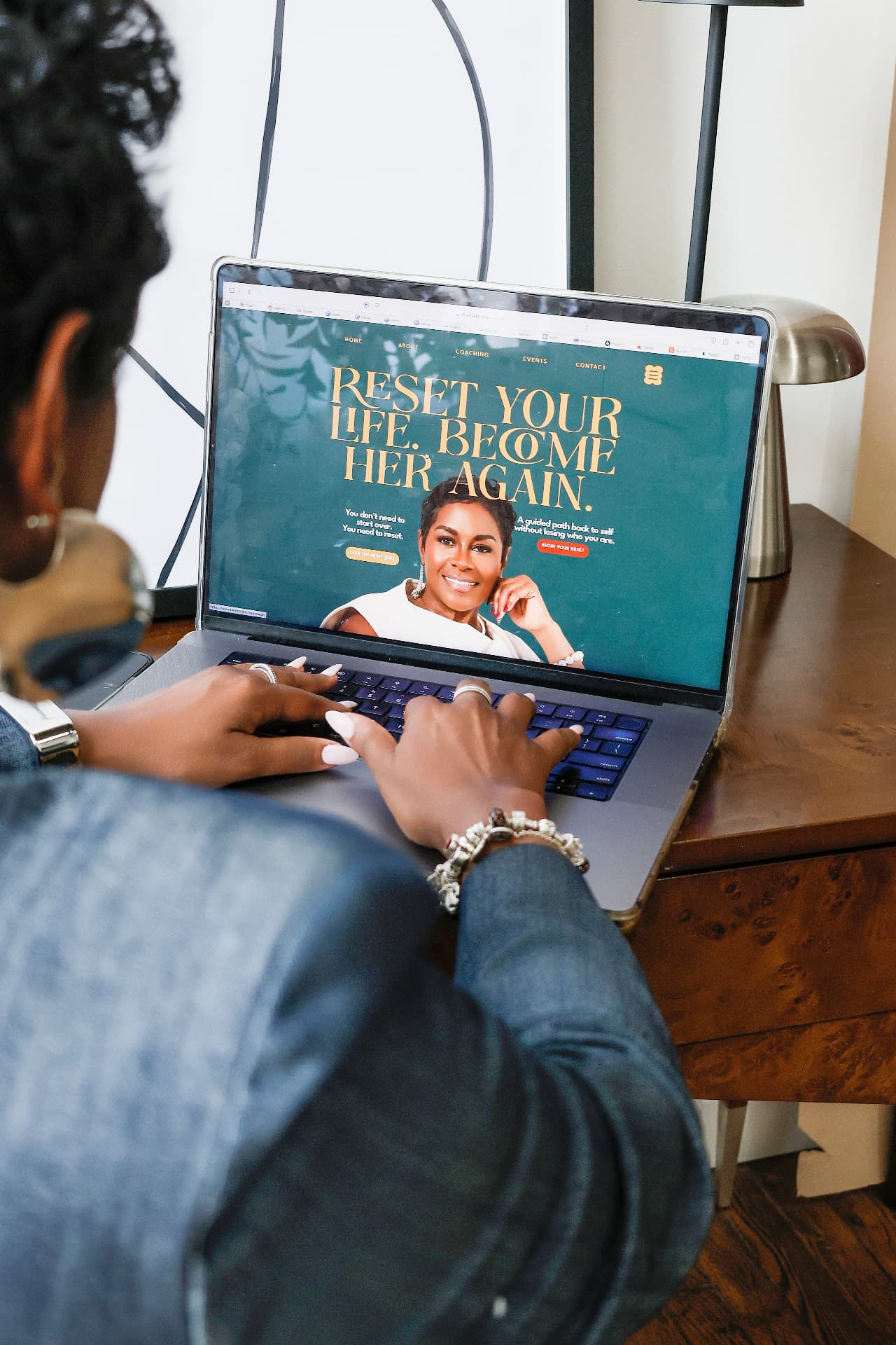 Creative entrepreneur working on a laptop during a brand content session
